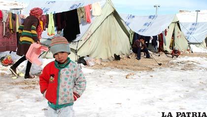 Niños sufren las inclemencias del tiempo  en Siria