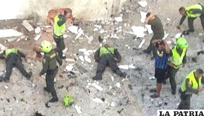El terror domina esta escena en la que se advierte a policías muertos y heridos /ELPAÍS.CR