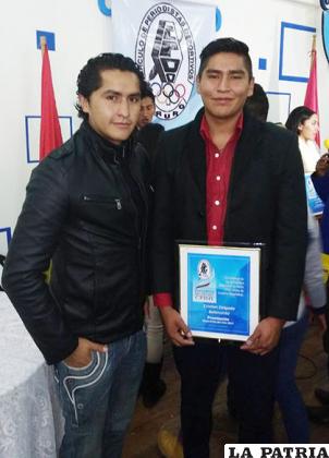 Cristhian Delgado (derecha) junto a su hermano Oscar