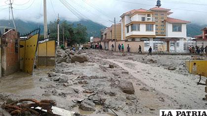 Las calles siguen inundadas de agua y lodo /Carmen Challapa