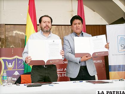El convenio que firmaron autoridades de GAMO y Segip /LA PATRIA