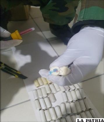 Uno de los sindicados expulsó 59 cápsulas con cocaína /Cortesía