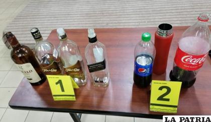 Las botellas encontradas en el lugar /Erbol
