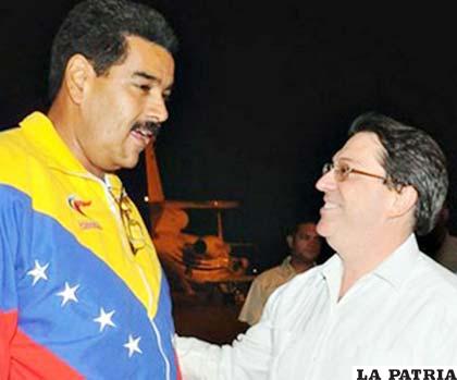 Presidente Nicolás Maduro es recibido por el canciller cubano Bruno Rodríguez a su arribo a La Habana
