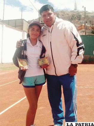 Urquidi con su entrenador Guevara