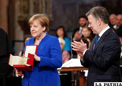Merkel recibe de Santos la 