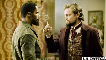 Leonardo DiCaprio y Jamie Foxx, en una de las escenas del filme “Django Unchained”