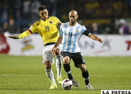 Gutiérrez y Mascherano en la disputa de la pelota /AS.COM