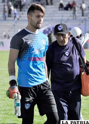 Escobar junto al portero Carlos Franco