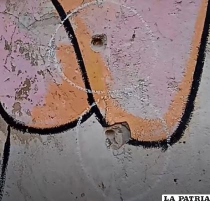 Impactos de bala en la fachada de la parroquia /Captura de video
