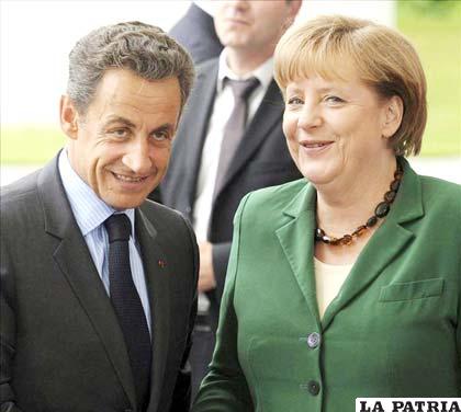 Presidente francés, Nicolas Sarkozy y la canciller alemana, Angela Merkel