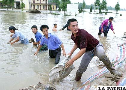 China sufre lluvias torrenciales, tifones y otros desastres naturales /info7.mx