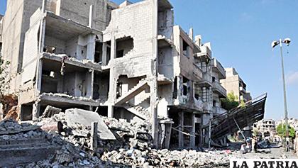 Varias explosiones reducen a escombros una calle de la ciudad de Homs (Siria) /20m.es

