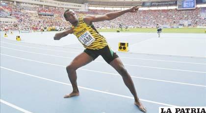 Usain Bolt completó su triplete en el mundial de atletismo