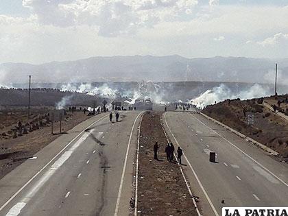 Momento del enfrentamiento entre policías y cooperativistas en Panduro