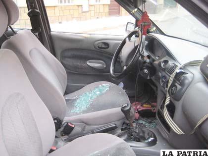 Vidrios rotos en el interior del motorizado