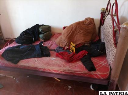 Investigadores procesan el cuarto donde posiblemente sucedió el crimen /Ministerio Público
