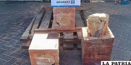 Droga camuflada en troncos de madera provenientes de Bolivia /PDI