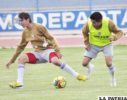 Bustamante y Torrico en el entrenamiento de los “santos”