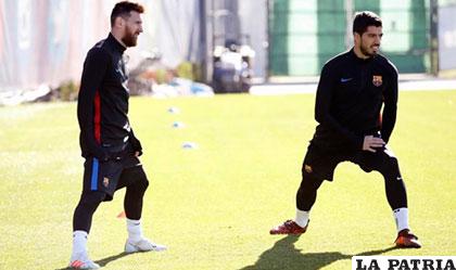 Lionel Messi junto a Luis Suárez en el entrenamiento del Barcelona /meridiano.com