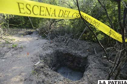 Fosa en México, donde fueron encontrados 17 cuerpos calcinados