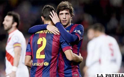 Montoya y Sergi Roberto, jugadores del Barcelona