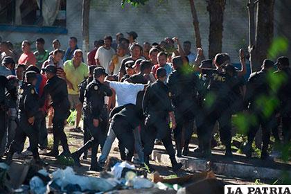 Guardias intentan controlar motín en prisión guatemalteca /elperiodico.com