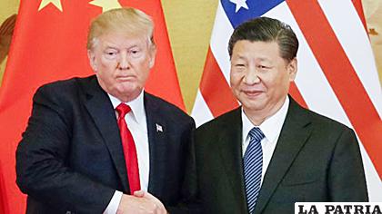 El presidente estadounidense Donald Trump (Izq.), con su homólogo chino, Xi Jinping /expansion.uecdn.es
