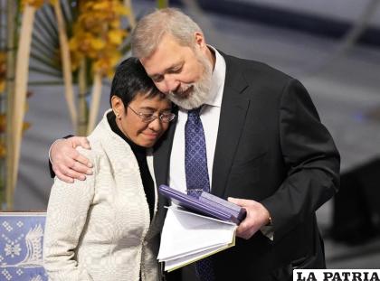 Los ganadores del Premio Nobel de la Paz Dmitry Muratov de Rusia y Maria Ressa de Filipinas /AP Foto /Alexander Zemlianichenko